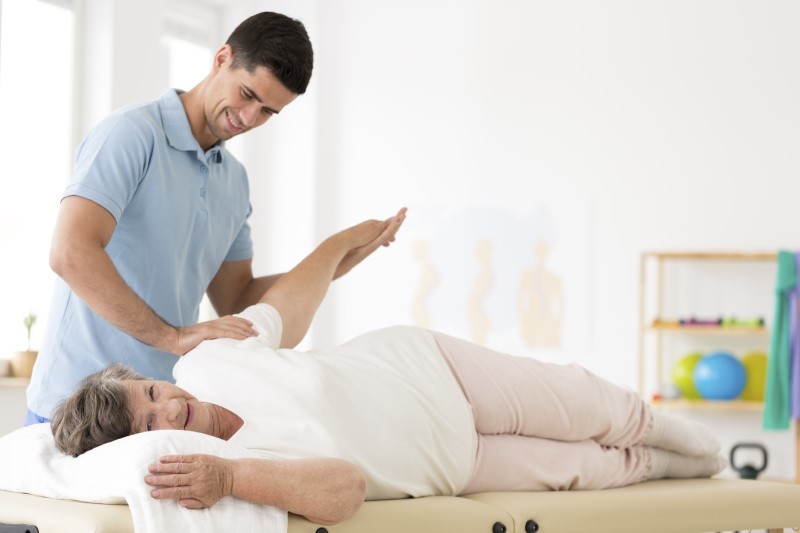 Senior rehabilitation with physiotherapist